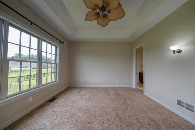 a view of an empty room and window