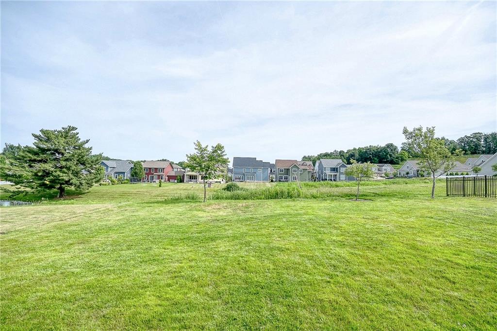 180 Seneca Place Mars, PA 16046 - Photo 38 of 42 View of the yard and lake on the left