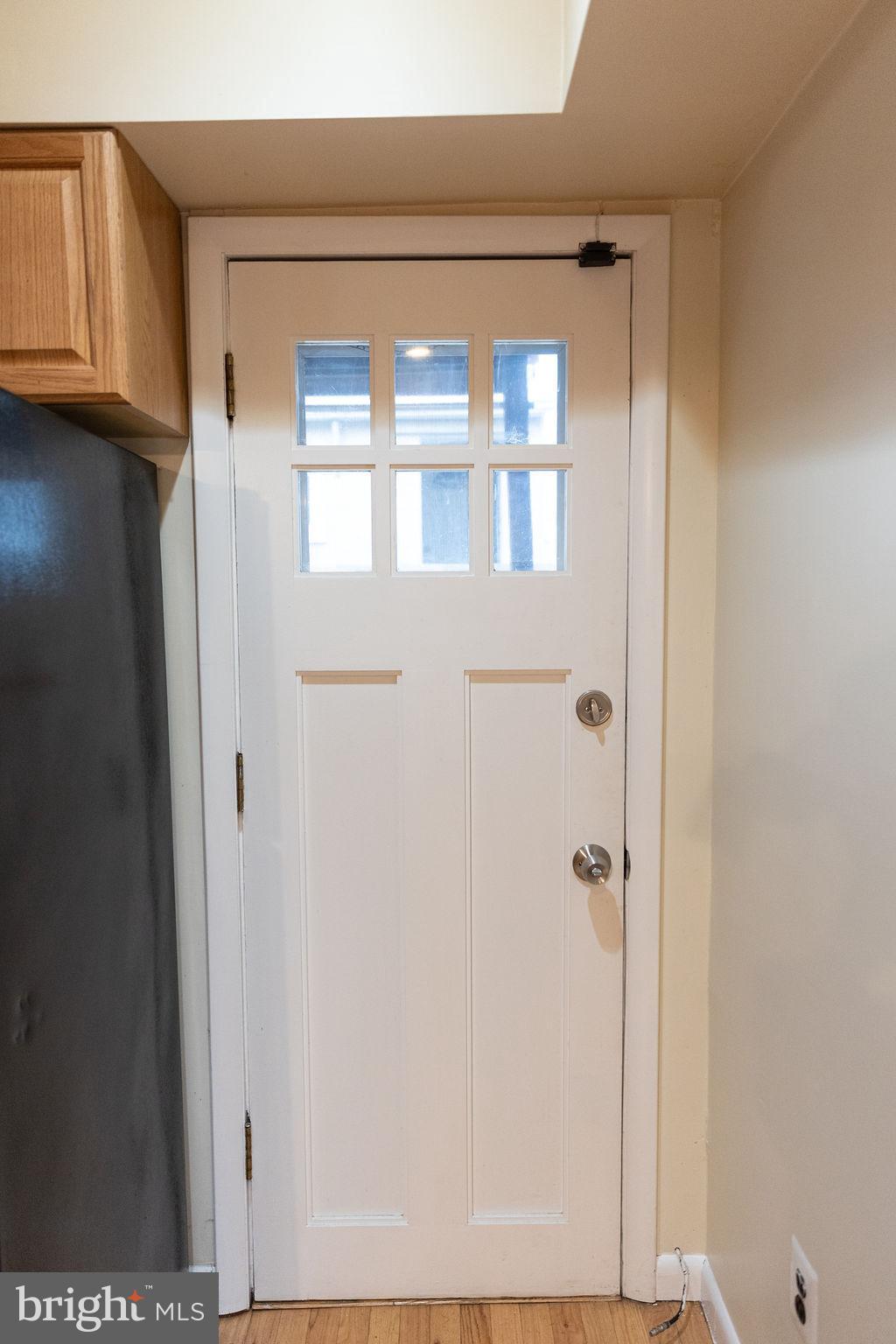 927 Binney Street Baltimore, MD 21224 - Photo 13 of 53 Door to patio from Kitchen