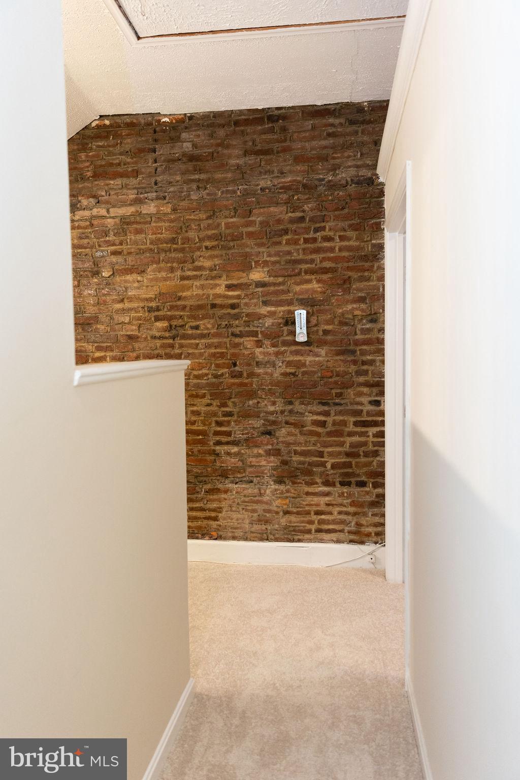 927 Binney Street Baltimore, MD 21224 - Photo 22 of 53 Top of stairs enters into changing room