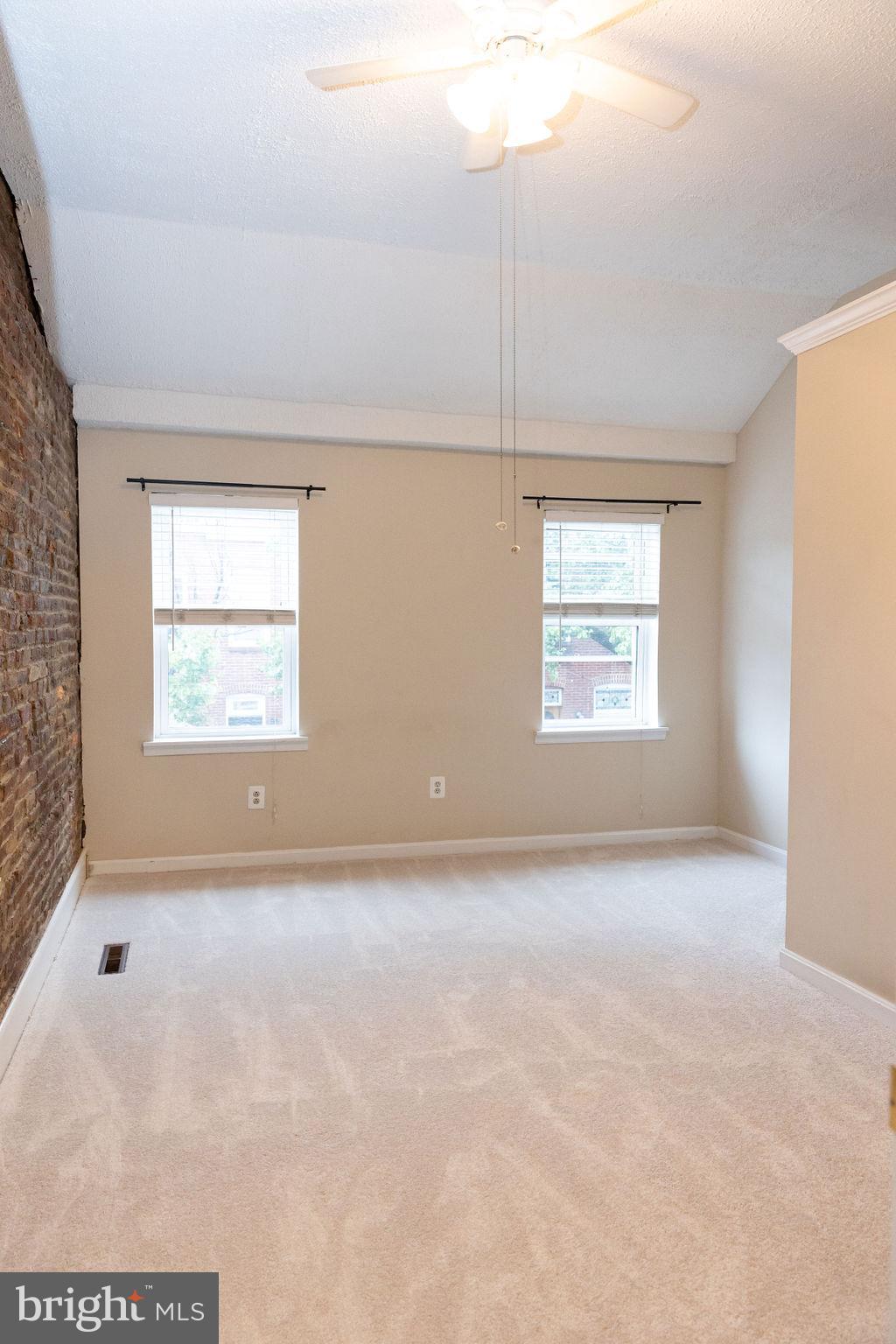 927 Binney Street Baltimore, MD 21224 - Photo 24 of 53 Cathedral ceiling in primary bedroom