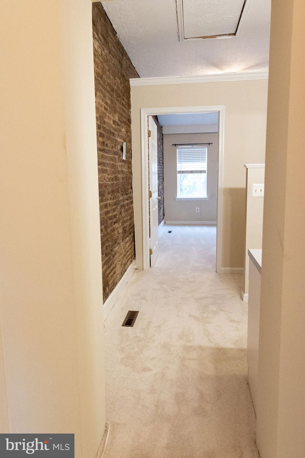 927 Binney Street Baltimore, MD 21224 - Photo 37 of 53 View from 2nd bdrm looking towards front of house