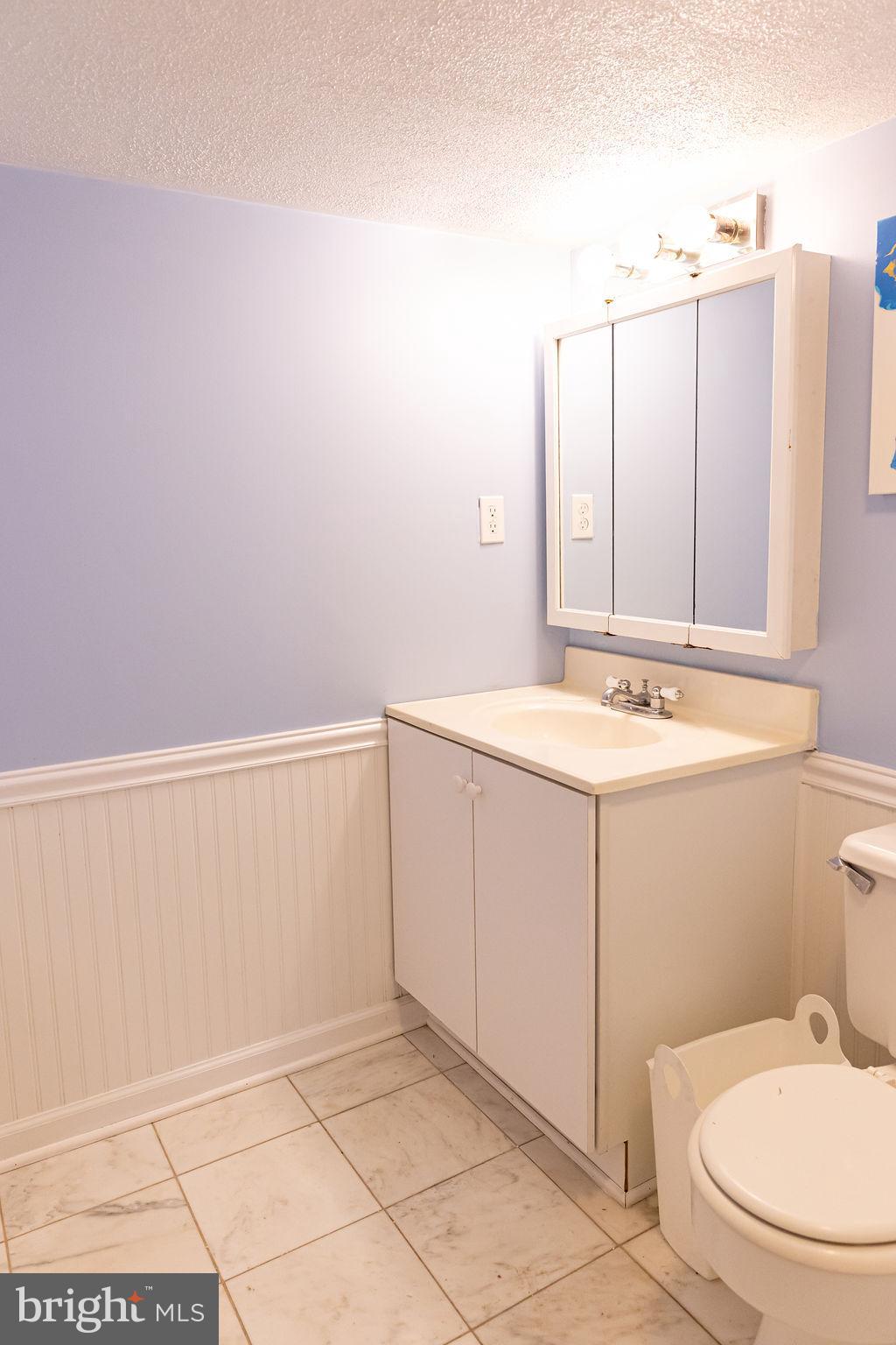 927 Binney Street Baltimore, MD 21224 - Photo 51 of 53 Basement full bathroom