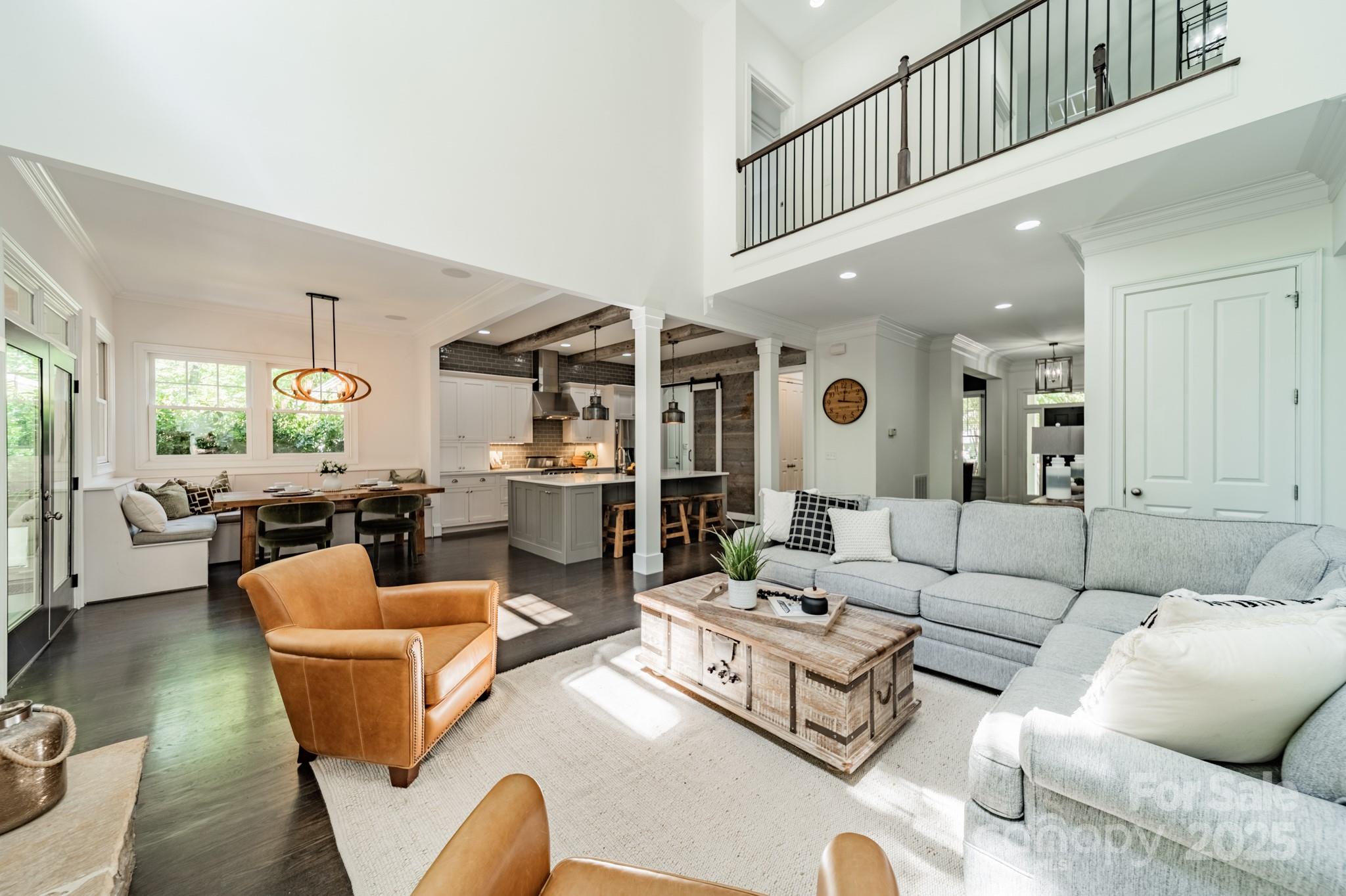 5868 Savona Terrace Fort Mill, SC 29708 - Photo 12 of 46 a living room with furniture kitchen view and a large window