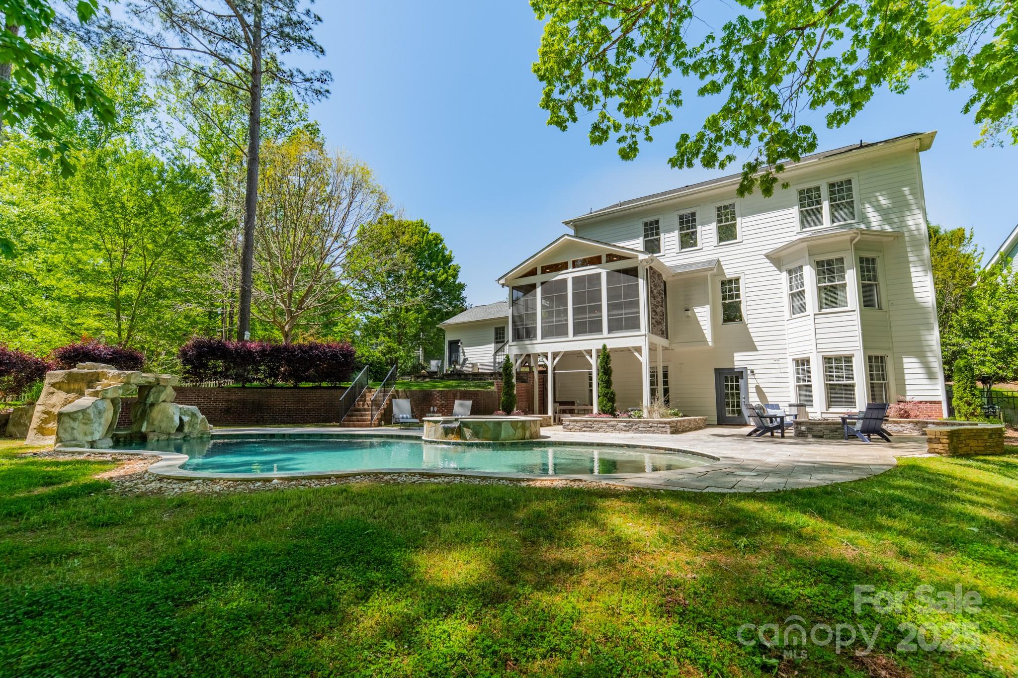 5868 Savona Terrace Fort Mill, SC 29708 - Photo 3 of 46 a front view of a house with garden and sitting area