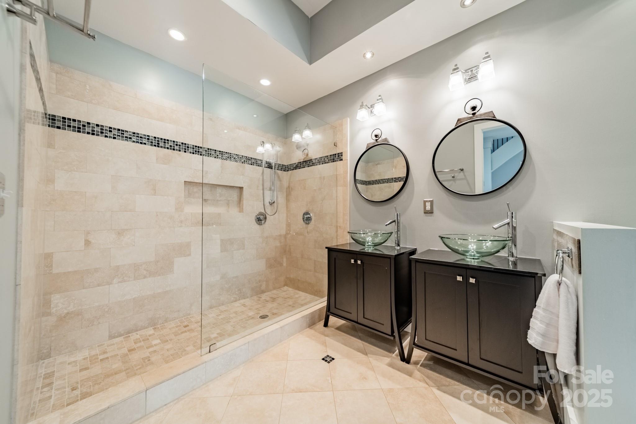 5868 Savona Terrace Fort Mill, SC 29708 - Photo 36 of 46 a bathroom with a mirror a sink and a mirror