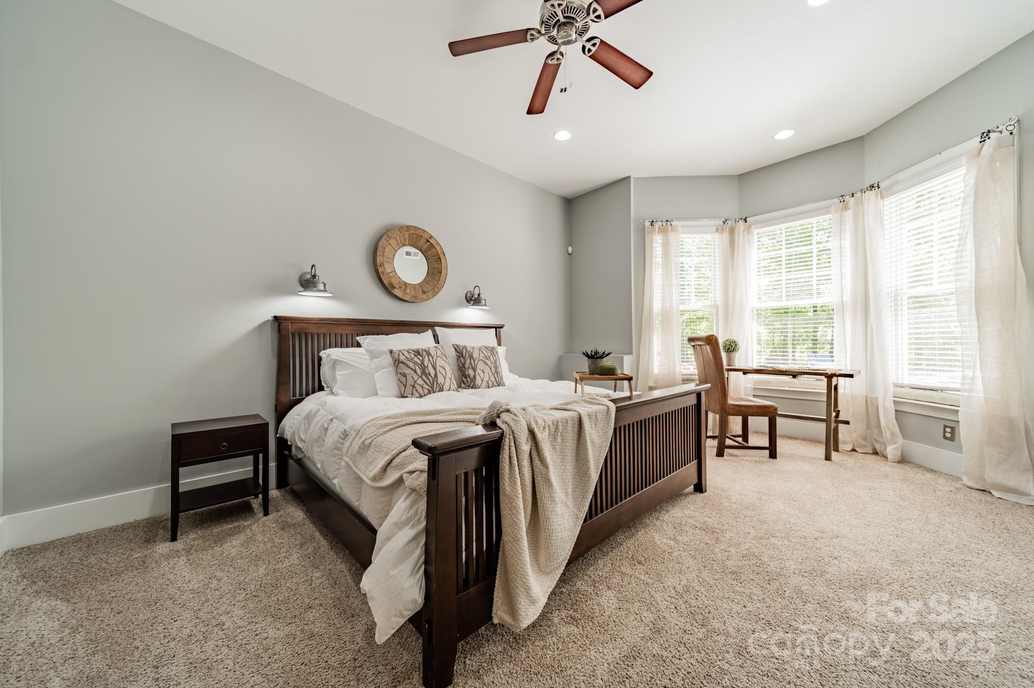 5868 Savona Terrace Fort Mill, SC 29708 - Photo 37 of 46 a bed room with a bed and a chair