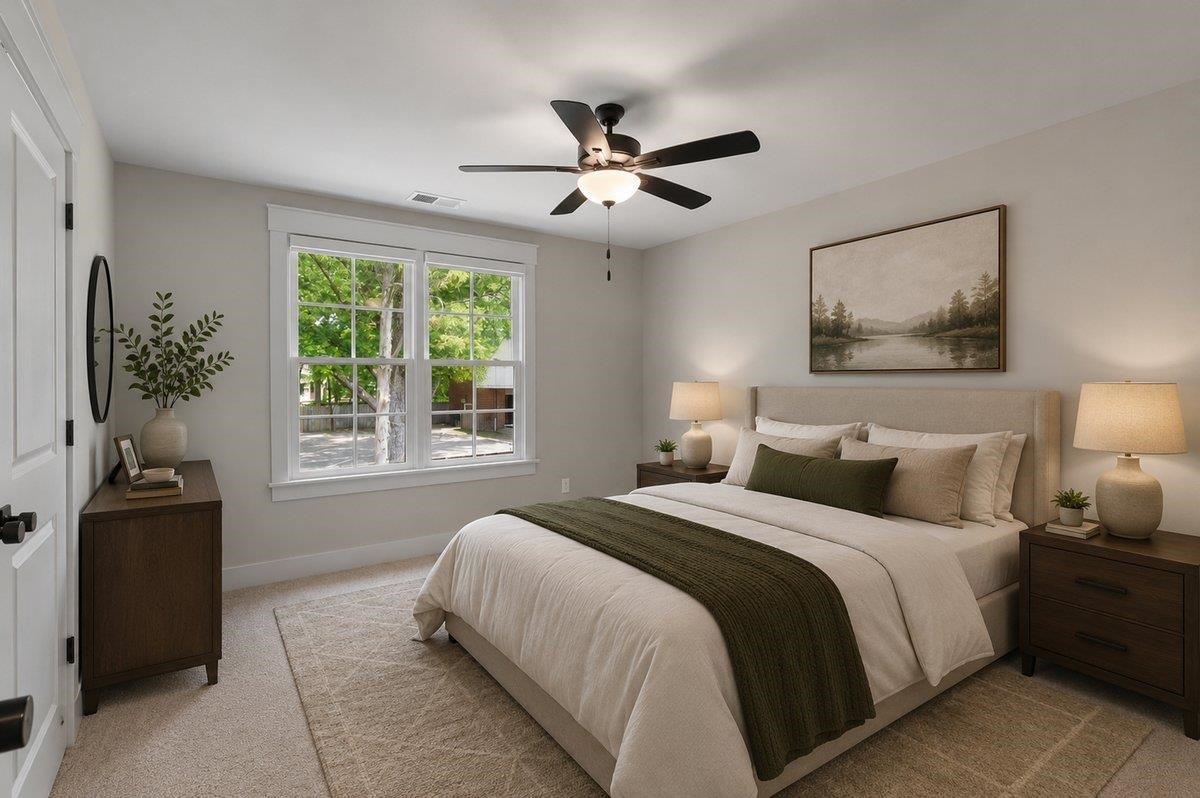 240 Burrows Road Collierville, TN 38017 - Photo 35 of 37 Spacious room featuring neutral paint, soft carpet, a window with white trim, and a ceiling fan with light fixture