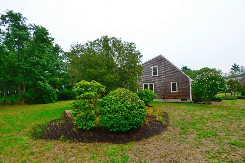 3 Bog Iron Road Wareham, MA 02576 - Photo 3 of 25 a house view with a garden space
