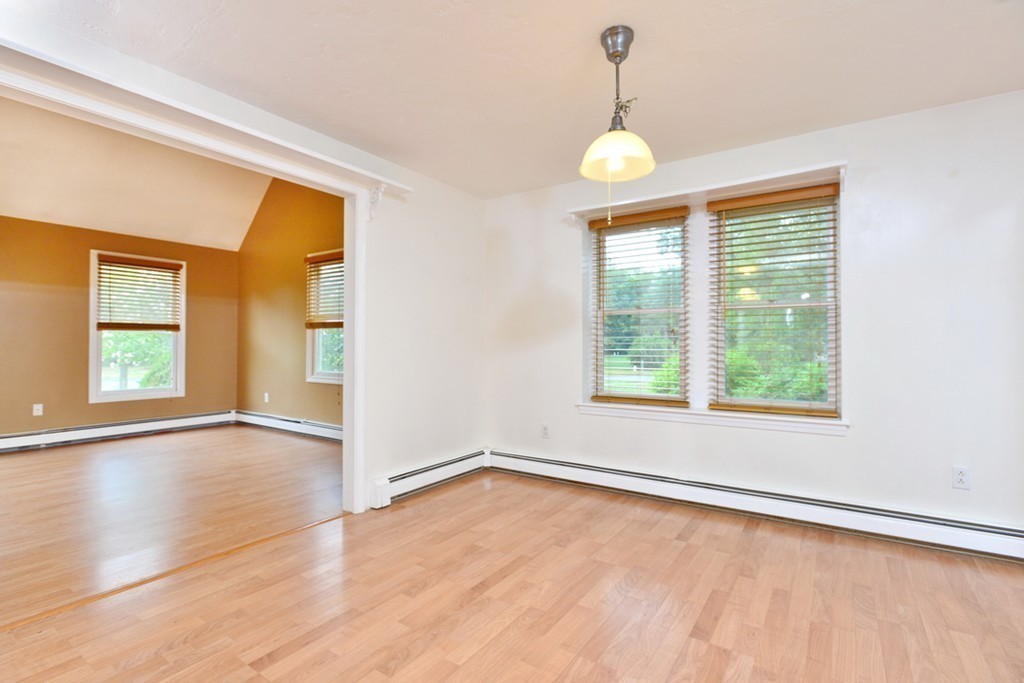 3 Bog Iron Road Wareham, MA 02576 - Photo 8 of 25 a view of an empty room with wooden floor and a window