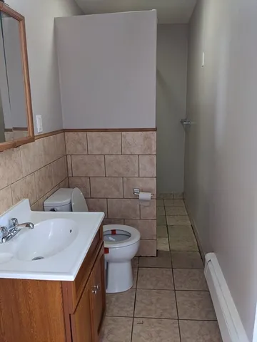 a bathroom with a sink and a toilet