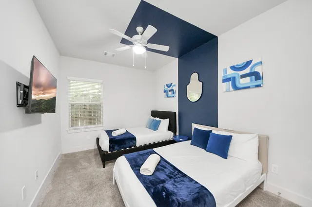 a living room with stainless steel appliances kitchen island granite countertop furniture and a kitchen view