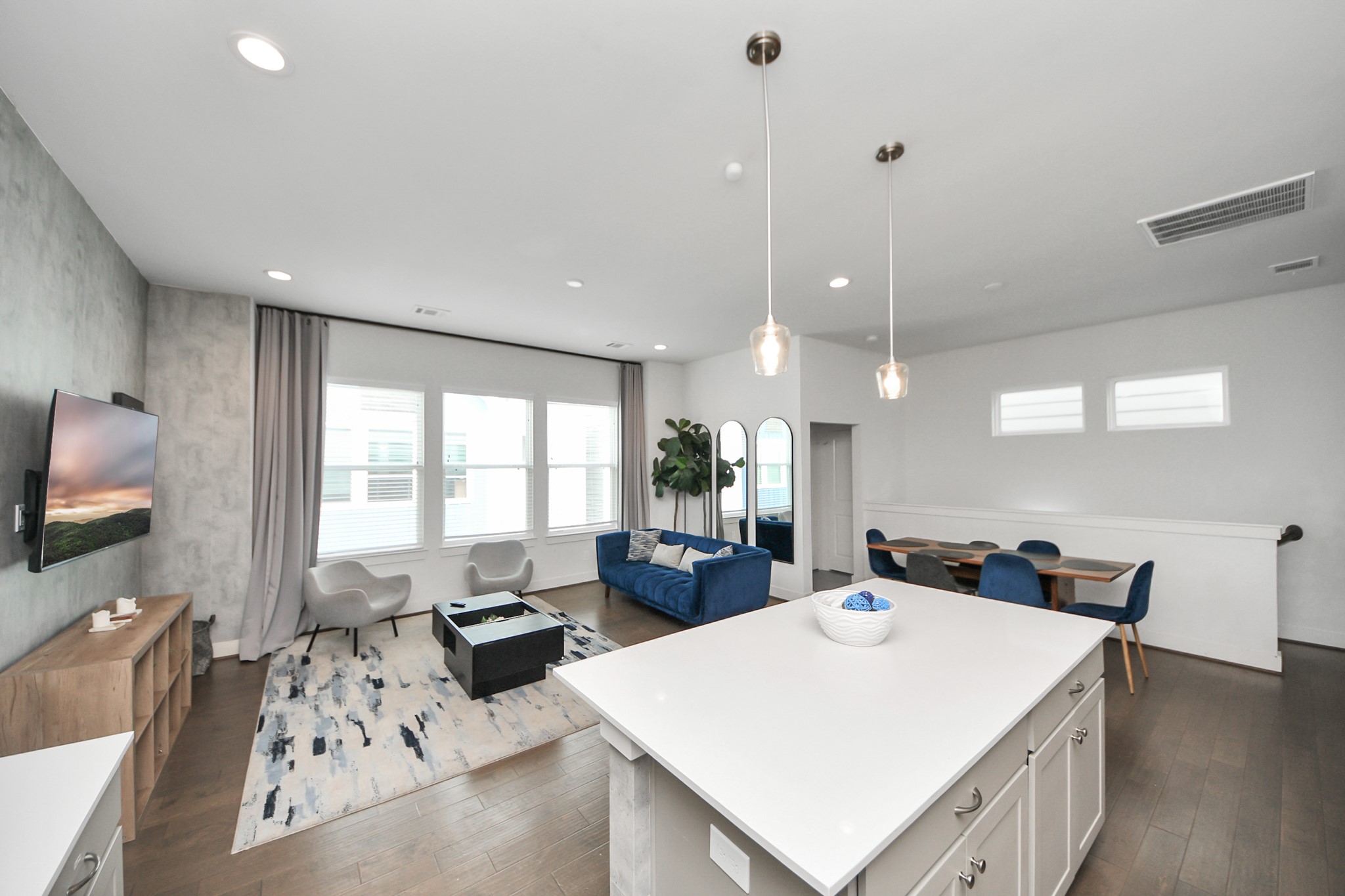 3642 Griggs Road Houston, TX 77021 - Photo 22 of 39 a large white kitchen with a large island sink and refrigerator
