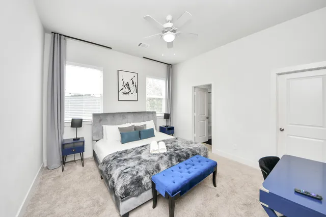a bathroom with a double vanity sink mirror and double
