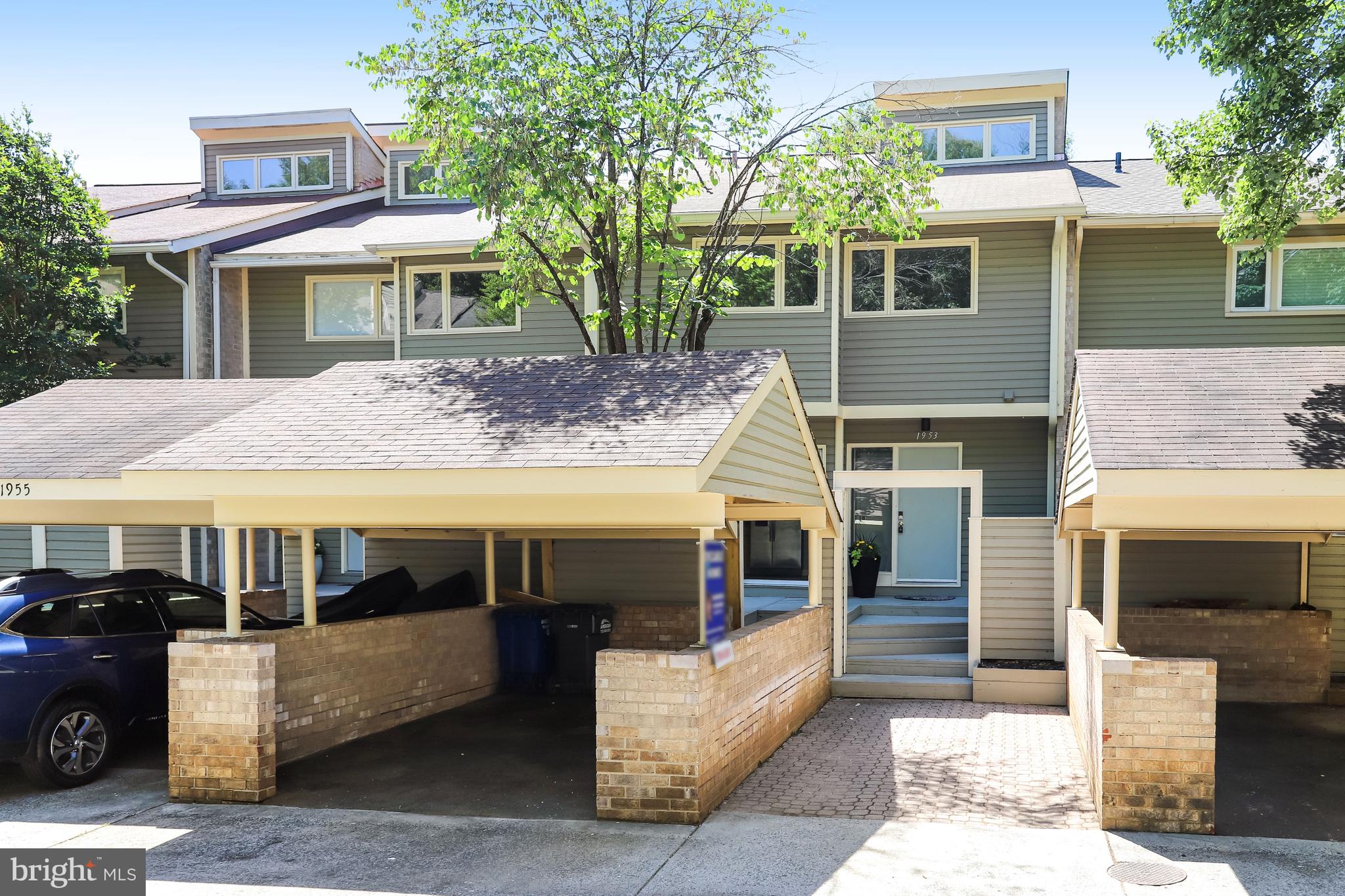 1953 Lakeport Way Reston, VA 20191 - Photo 58 of 60 a front view of a house with a garage