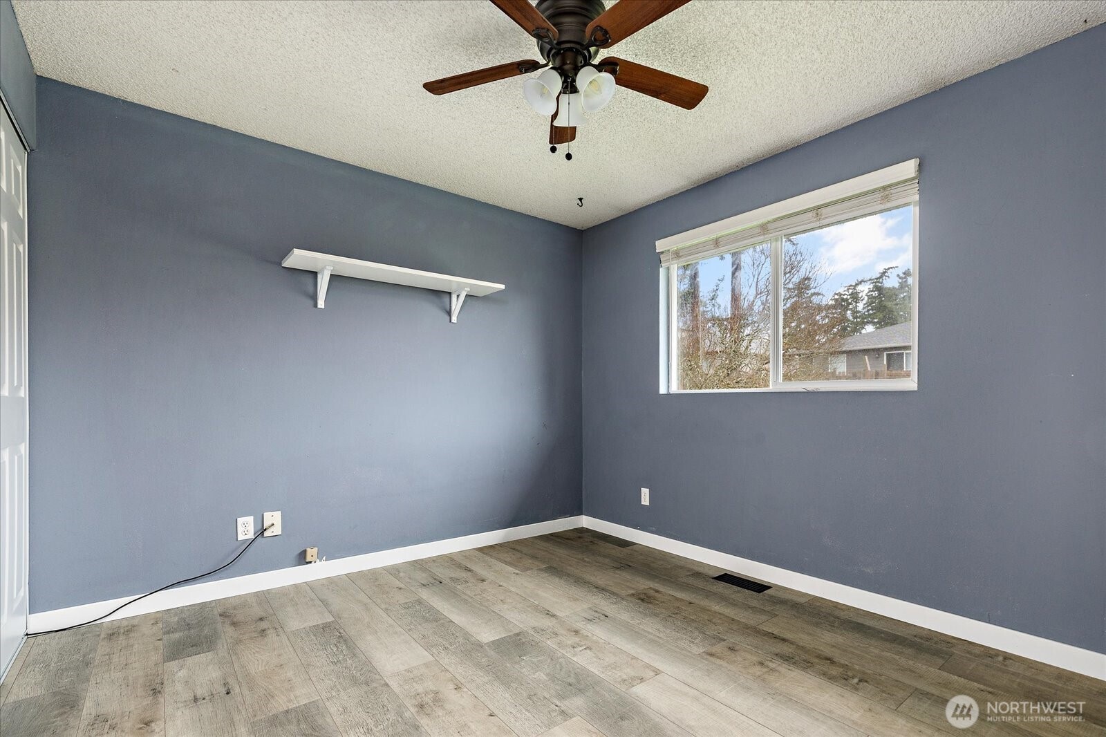 1146 Ridgeway Drive Oak Harbor, WA 98277 - Photo 14 of 25 a view of room with window and ceiling fan