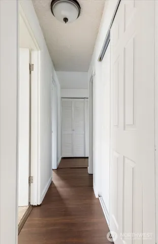 a view of entryway with wooden floor