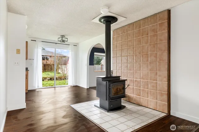 a view of an entryway with wooden floor