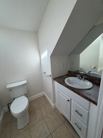 a bathroom with a sink and a toilet