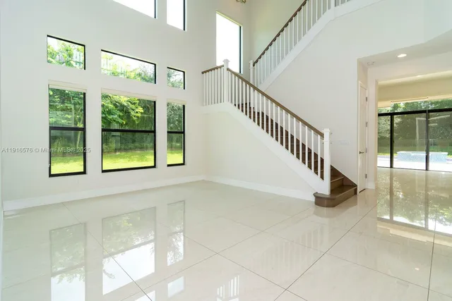 a view of an empty room with a sliding door