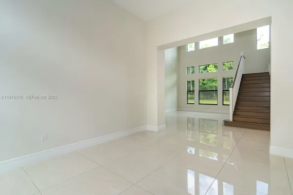 a view of an empty room with a window