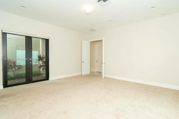 a view of small space with racks on the wall