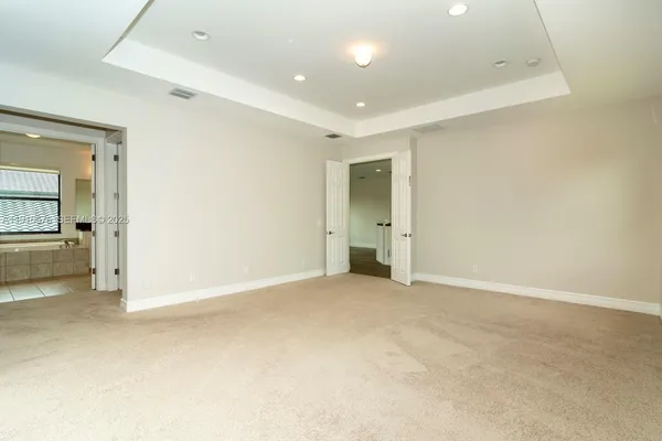 a bathroom with a shower and a toilet