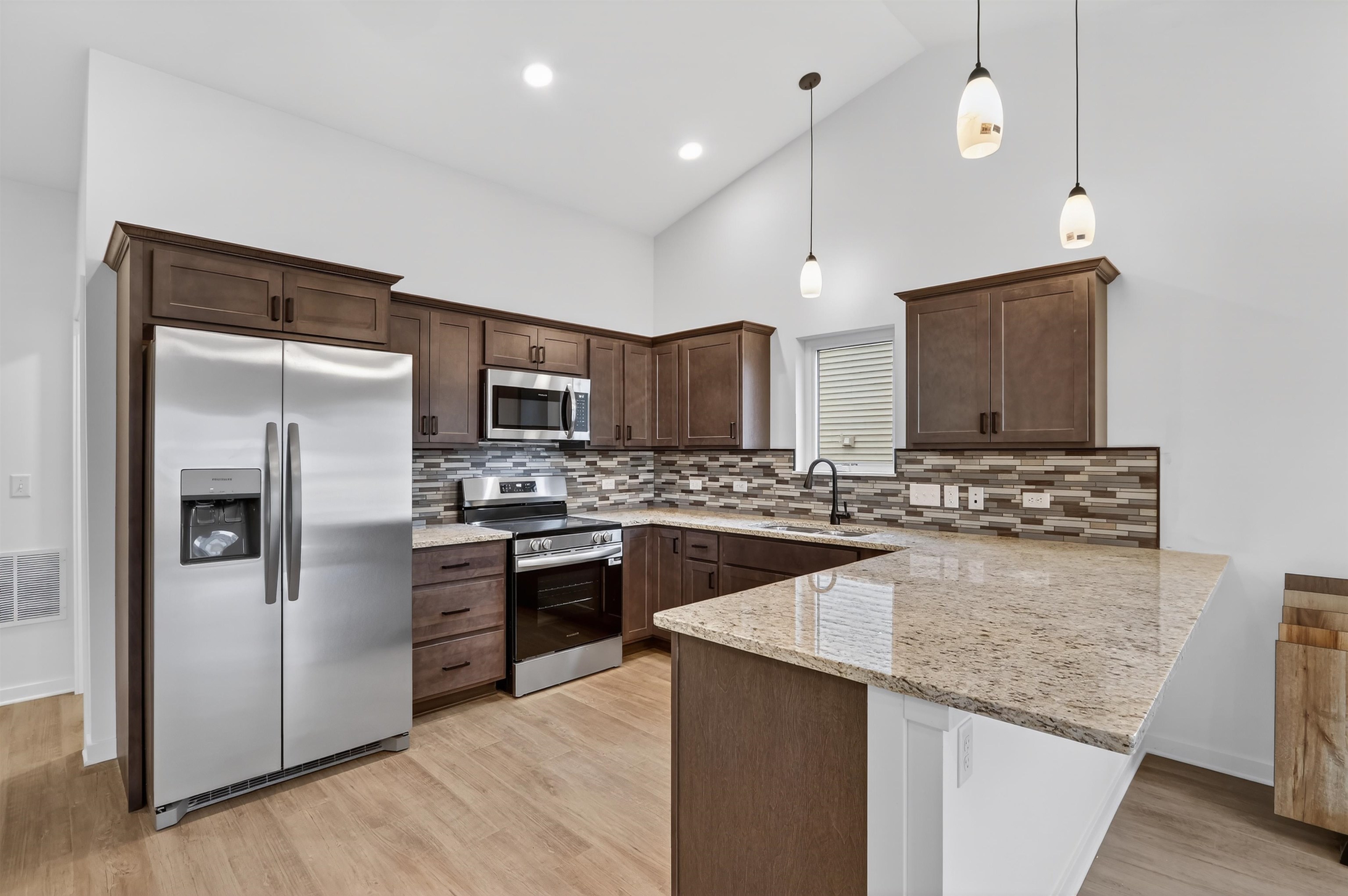 307 West South Street Durand, IL 61024 - Photo 13 of 27 a kitchen with a sink stainless steel appliances and counter space