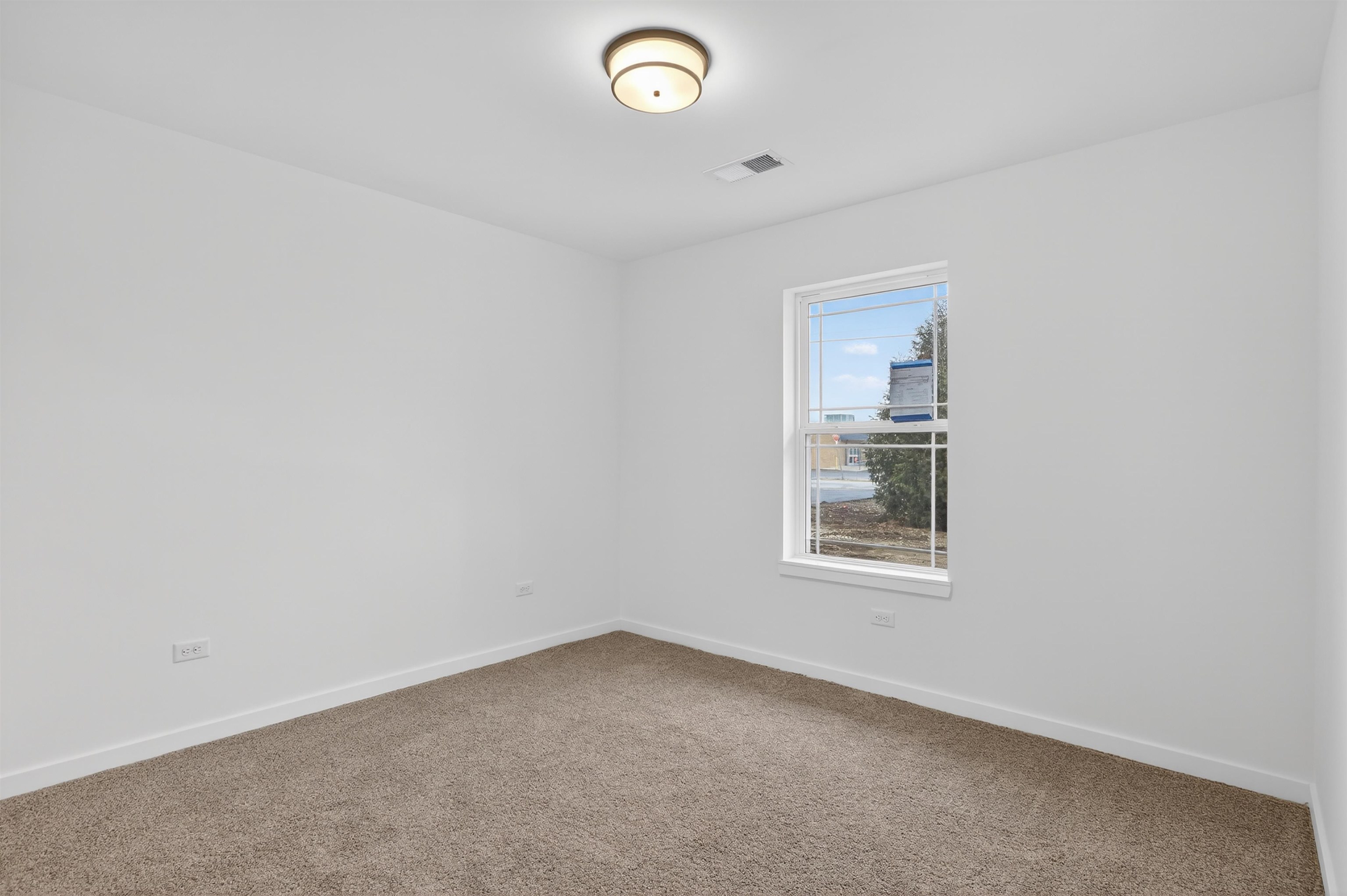 307 West South Street Durand, IL 61024 - Photo 17 of 27 an empty room with a window