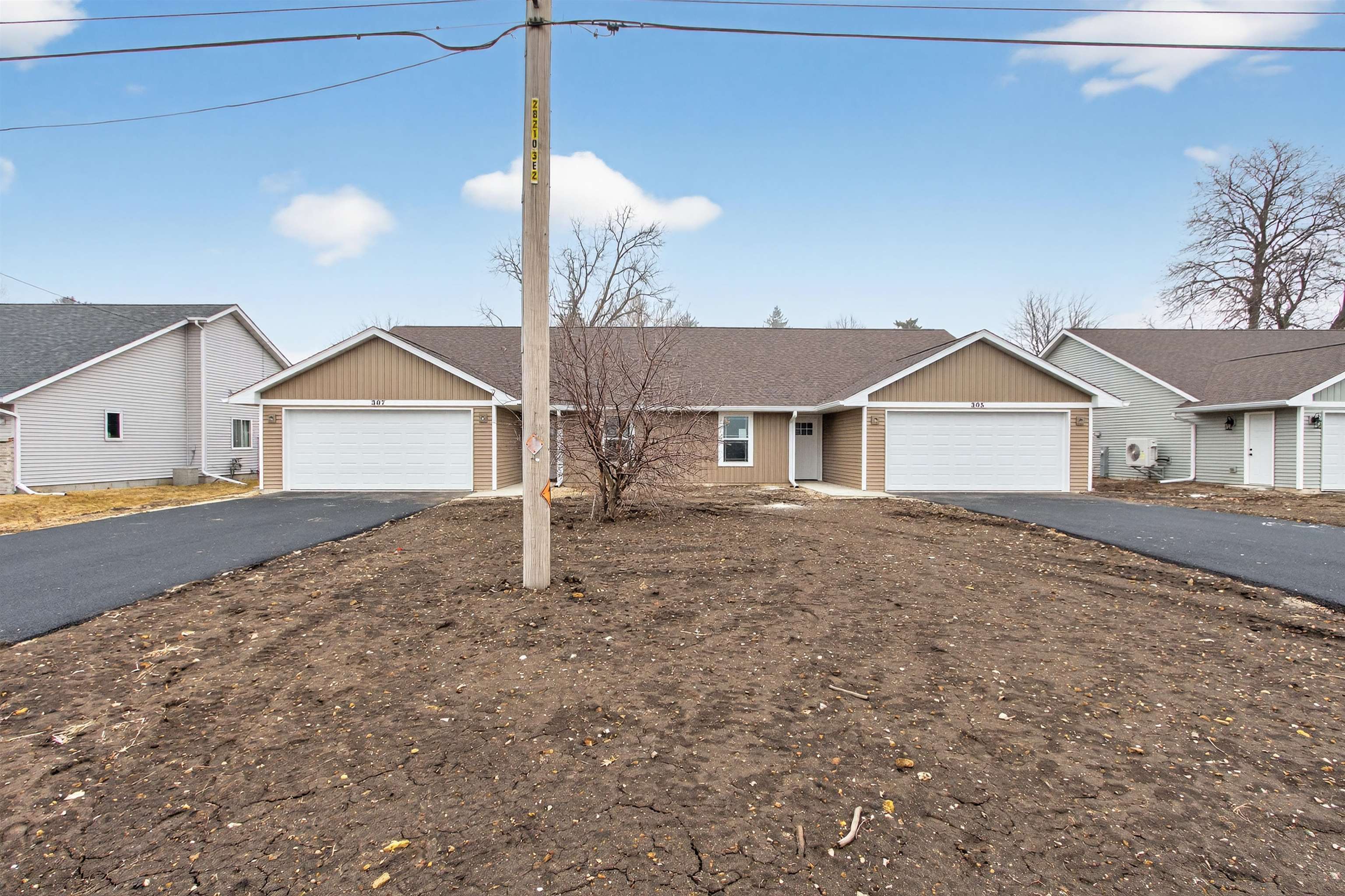 307 West South Street Durand, IL 61024 - Photo 2 of 27 a view of a house with a yard