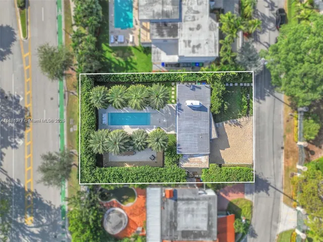 aerial view of a house with a garden