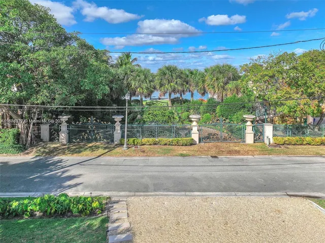 a view of a lake with a big yard