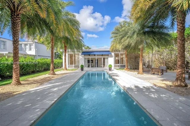 a view of a yard in front of a house