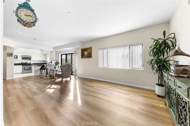 a view of livingroom with furniture and workspace