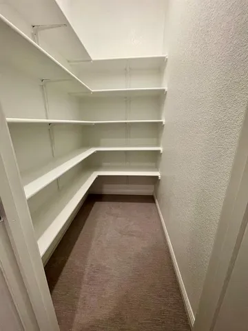 a view of room with shelf