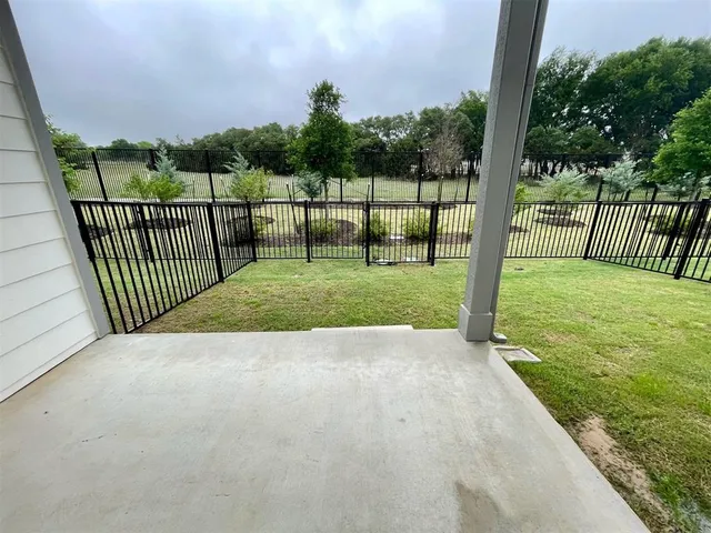 a view of a backyard with a garden