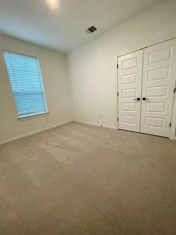 an empty room with closet