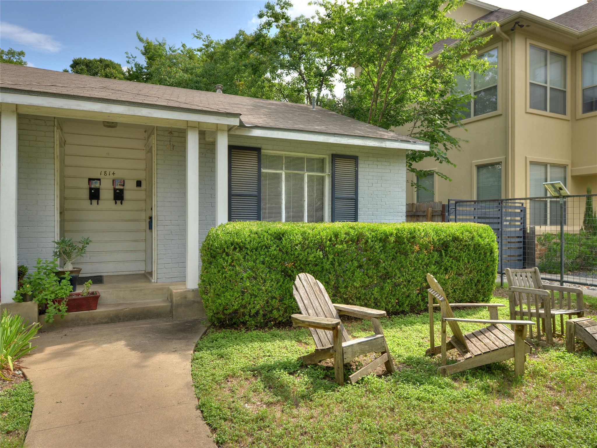 1814 West 38th Street Austin, TX 78731 - Photo 1 of 1 a view of a chair and table in backyard of the house