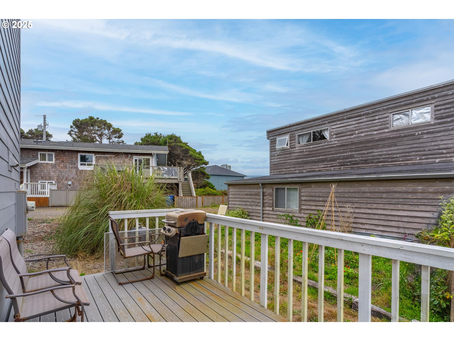 60 Raven Lane Depoe Bay, OR 97341 - Photo 13 of 43 a view of a balcony with chairs