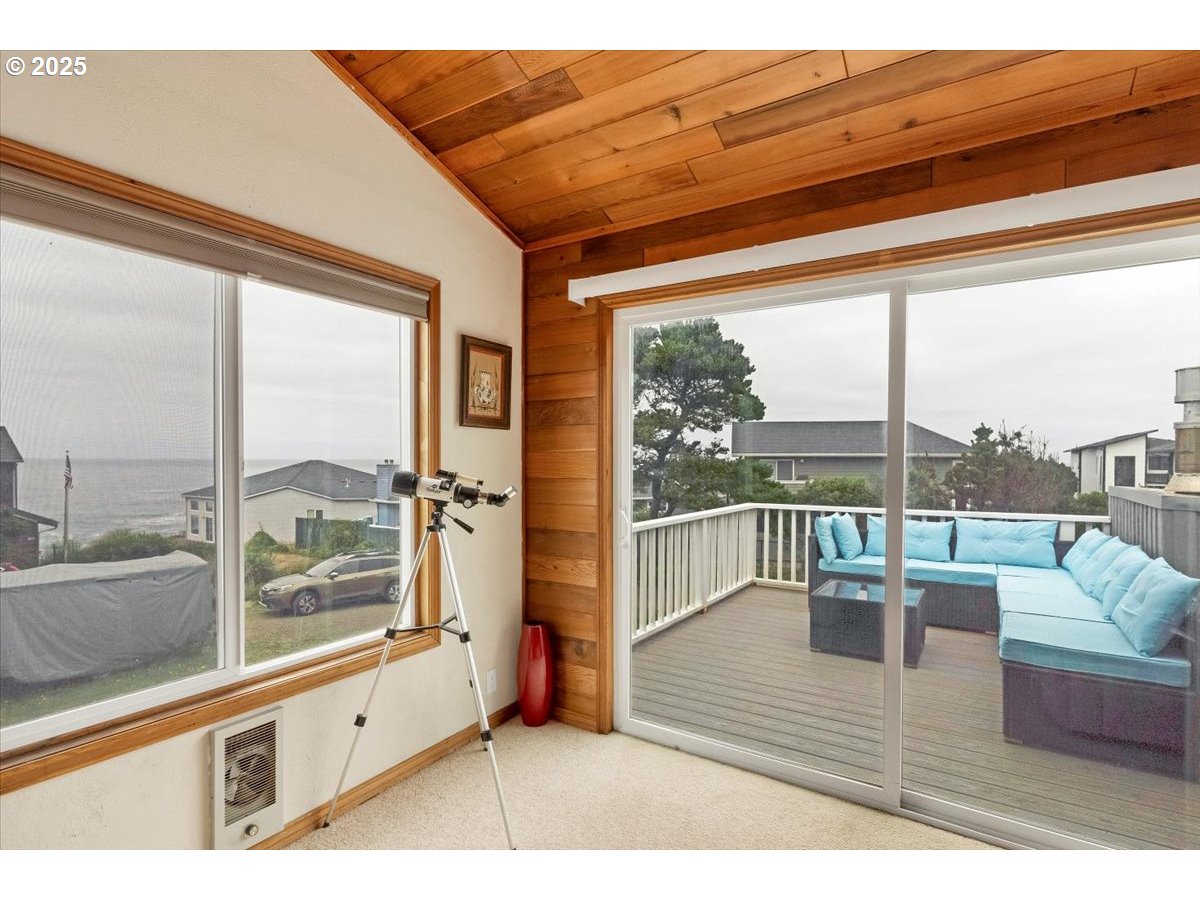 60 Raven Lane Depoe Bay, OR 97341 - Photo 29 of 43 a living room with a large window