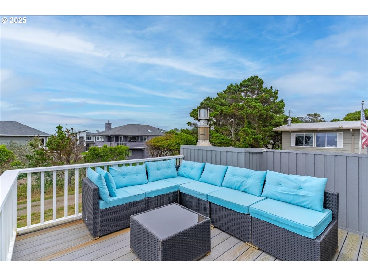 60 Raven Lane Depoe Bay, OR 97341 - Photo 30 of 43 a view of roof deck with couches and potted plants