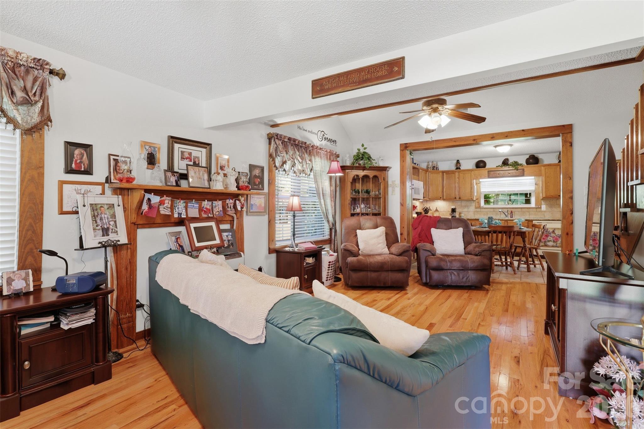 176-174 Oak Hollow Road Union Grove, NC 28689 - Photo 23 of 48 a living room with furniture and a flat screen tv