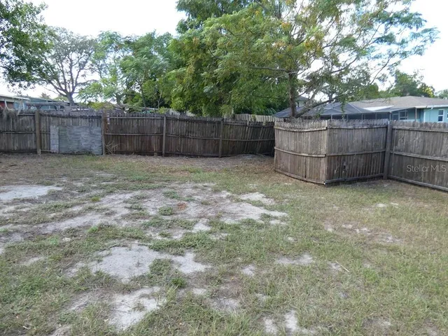 a view of backyard of house