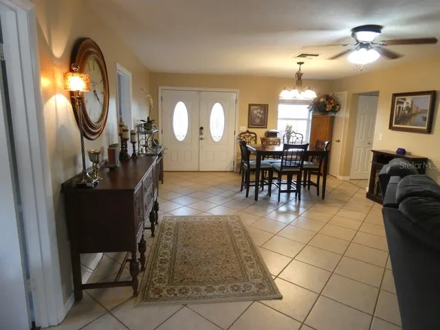 a view of a backyard with large trees