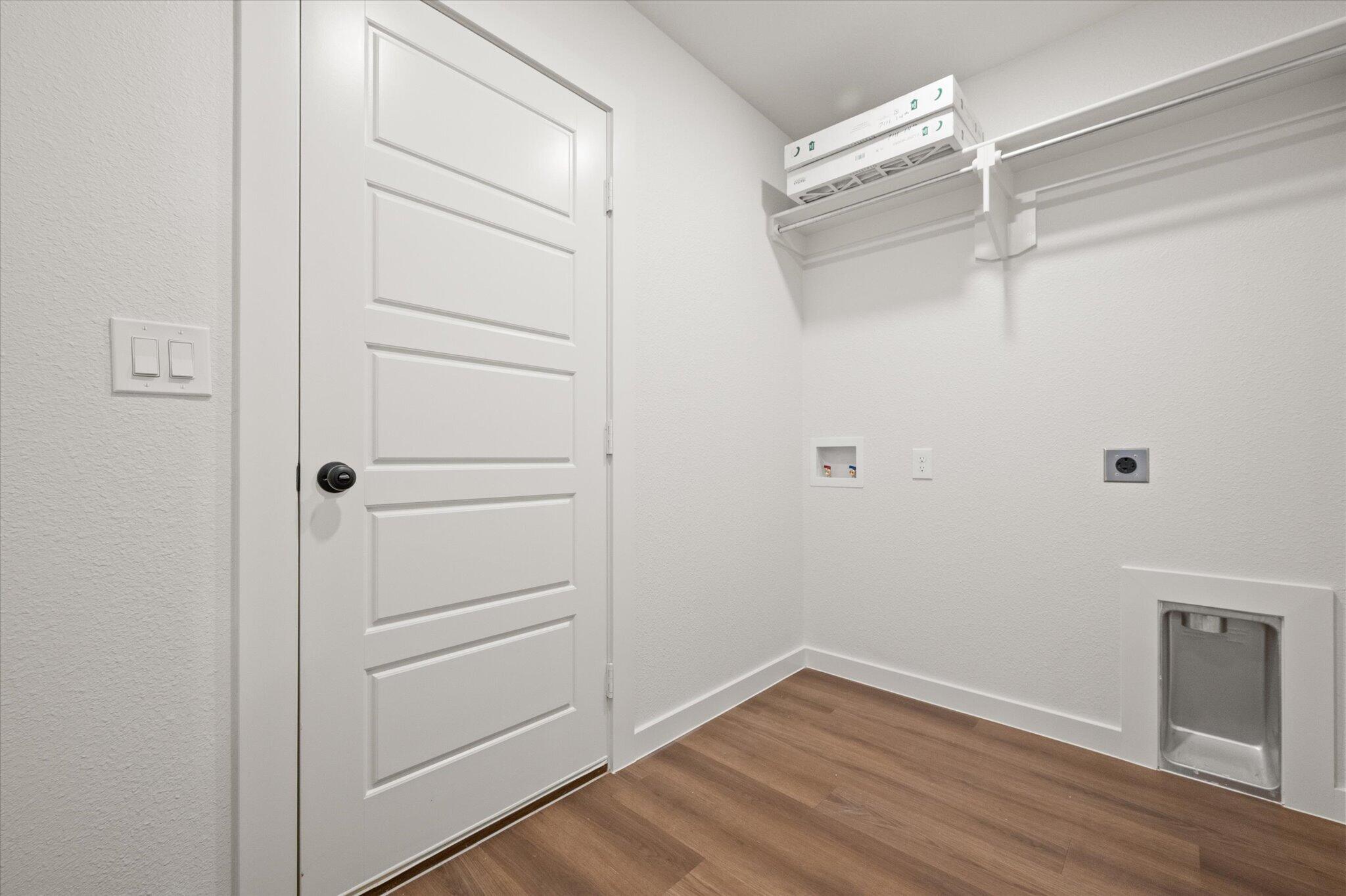 7111 14th Street Lubbock, TX 79416 - Photo 24 of 25 a view of a room with wooden floor