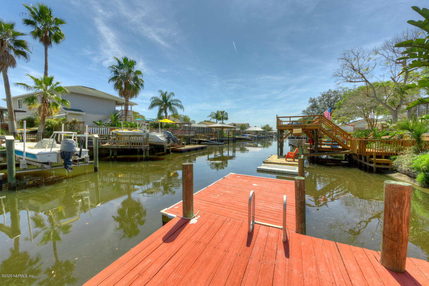 4111 San Pablo Road South Jacksonville, FL 32250 - Photo 31 of 46 a view of a lake with couches and lounge chairs