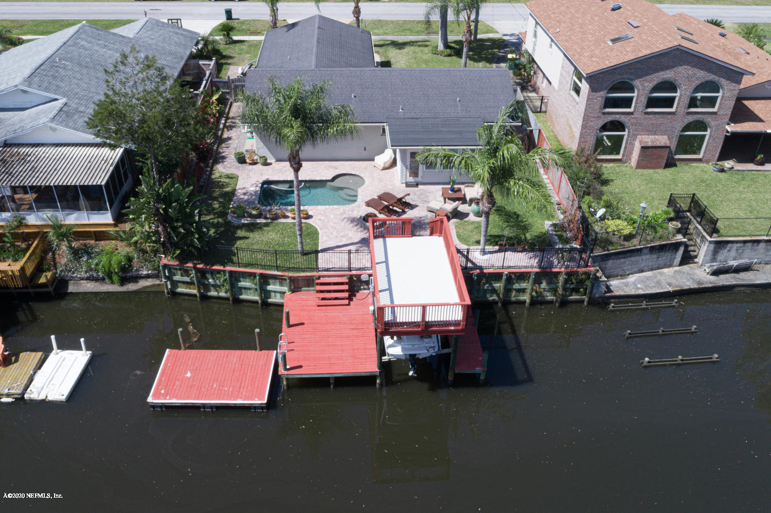 4111 San Pablo Road South Jacksonville, FL 32250 - Photo 37 of 46 an aerial view of a house with swimming pool and outdoor seating