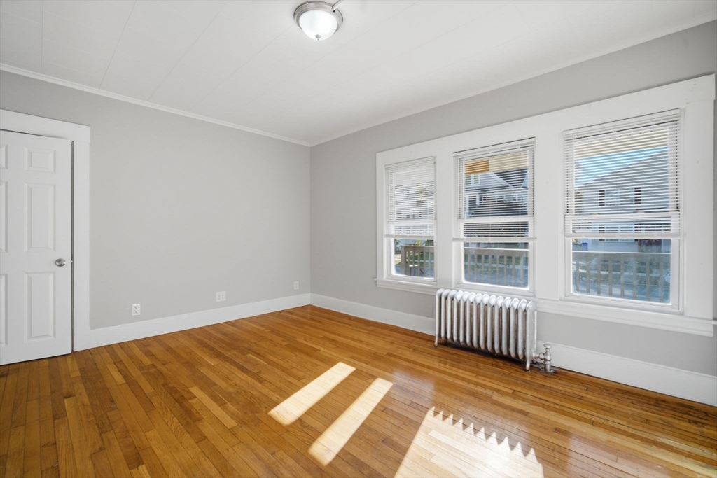 35-37 Whittier Street Springfield, MA 01108 - Photo 14 of 24 a view of an empty room with a window