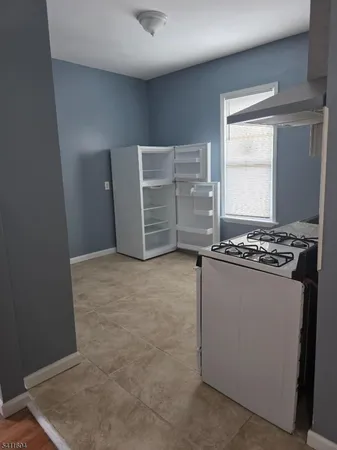 a view of kitchen with washer and dryer