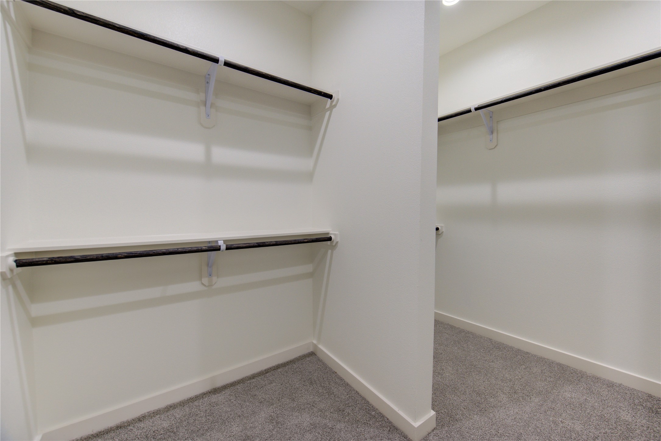 2920 El Fenice Lane Houston, TX 77057 - Photo 17 of 42 a view of an empty walk in closet